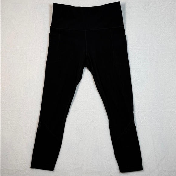 Athleta Pants - Athleta Women’s Black Mesh Salutation Leggings size Medium with pockets